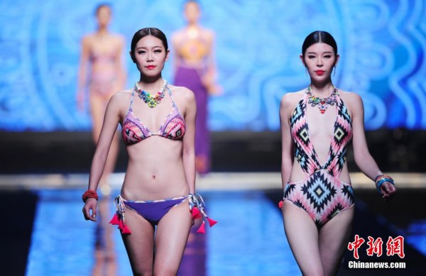 5��10�գ���2014SIUF�й������ڣ���������չ�����ϣ���ģ�����ջ������㡣